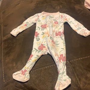 White and pink floral footie pjs.